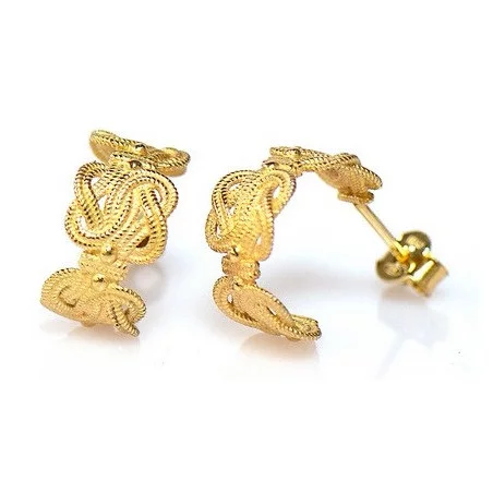 Mattenklopper oorbellen kopen | Mattenklopper oorbellen goud | Mattenklopper oorbellen betekenis