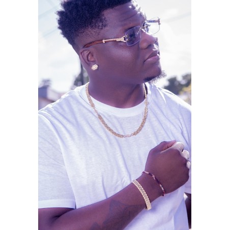 Gouden mattenklopper oorbellen | Surinaamse mattenklopper oorbellen